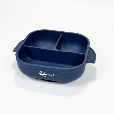 Blue square silicone baby plate photographed from angled front-top view