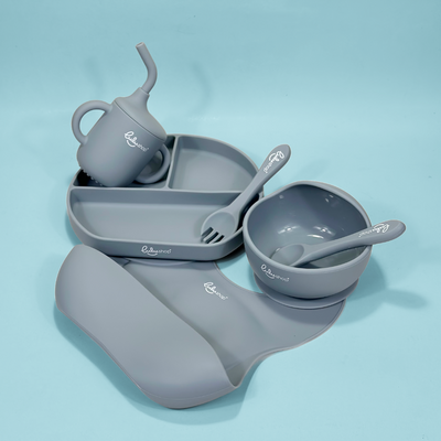 Lulushop 6-piece baby feeding set in Sky Grey, featuring silicone suction plate, bowl, bib, cup, and utensils.